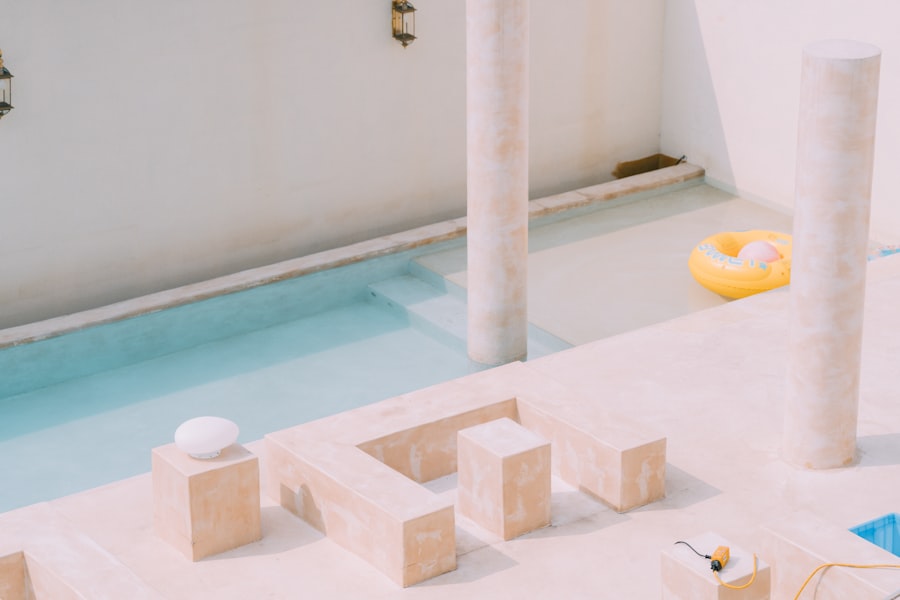 A minimalist plunge pool with a built-in bench seat